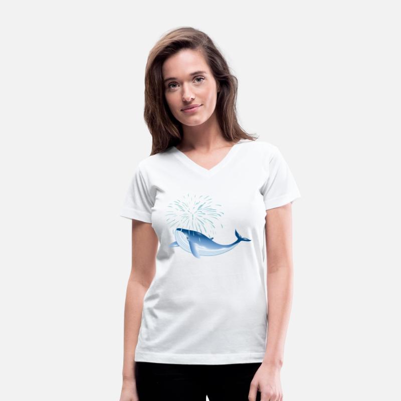 bright blue whale fish in the ocean with fountain